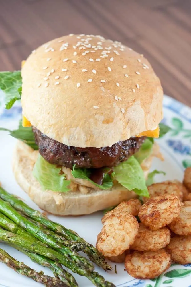 These Healthier Bread Machine Hamburger Buns are made more nutritious by using white whole wheat flour, but they are just as soft and fluffy as the original.