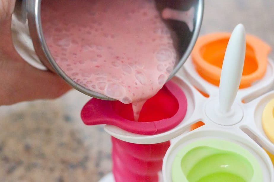 These Strawberry Greek Yogurt Popsicles are a healthy and refreshing frozen treat that everyone will look forward to on a hot summer day.