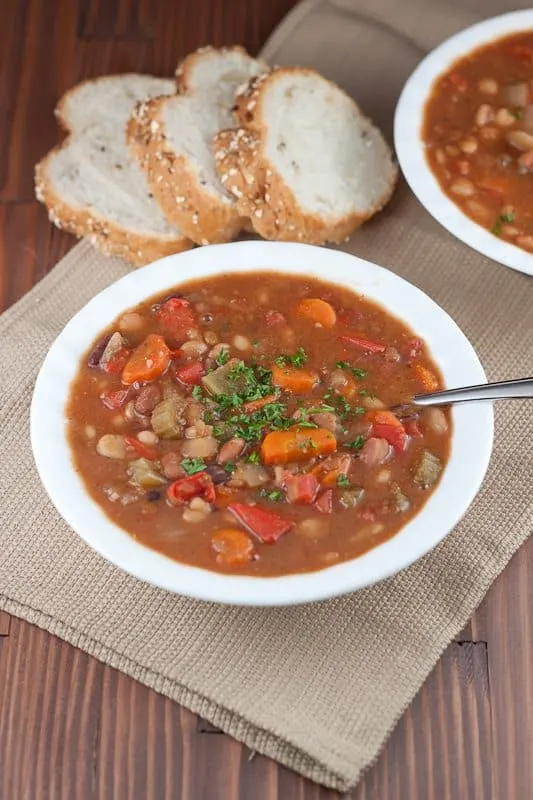 This Instant Pot 15 Bean Soup Recipe is a meatless one-pot dish that is made so much faster by cooking dried beans right in your Instant Pot with the soup. Perfect for a healthy weeknight dinner!