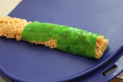 A roll of rice crispies wrapped in a fruit roll-ups. 