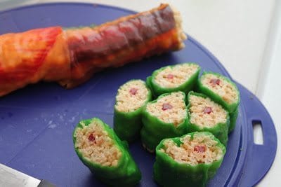 A slices of rice crispies wrapped in a fruit roll-ups. 