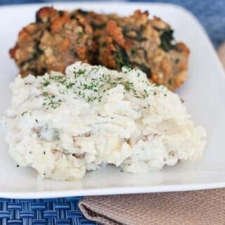 A Ranch Mashed Potatoes in a white plate