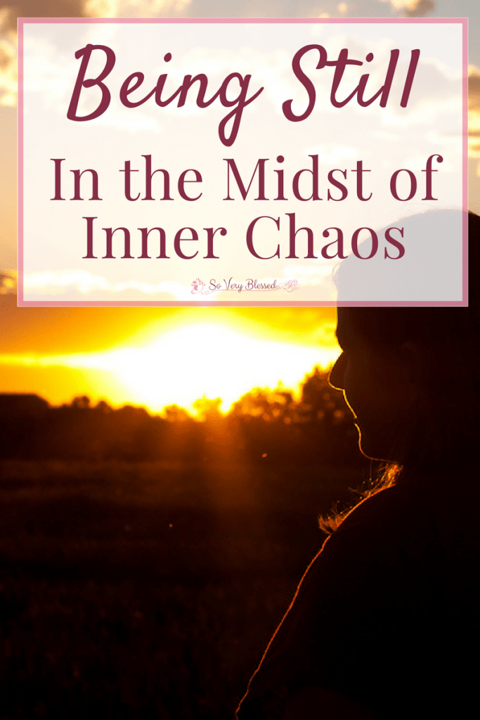 Photo of Becky watching the sunset with the textoverlay that reads as 'Being Still In the Midst of Inner Chaos'. It is so hard to be still in the midst of stress, jumbled thoughts, and overwhelming emotions. This is how I find calm in the middle of the storm.