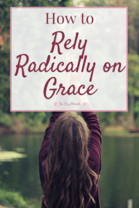 A woman outside looking in the sky with the text overlay that reads as 'How to Rely Radically on Grace'