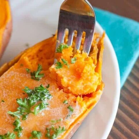 A photo of a sweet Potatoes cooked in an Instant Pot served in a white plate. These Instant Pot Sweet Potatoes are made so much quicker than the oven, making it the perfect healthy recipe for your weekly meal prep.