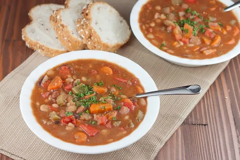 This Instant Pot 15 Bean Soup Recipe is a meatless one-pot dish that is made so much faster by cooking dried beans right in your Instant Pot with the soup. Perfect for a healthy weeknight dinner!