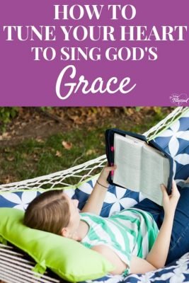 A photo of Becky in a hammock holding and reading her Bible, with a text overlay that reads as 'Tune My Heart To Sing Thy Grace': So Very Blessed.