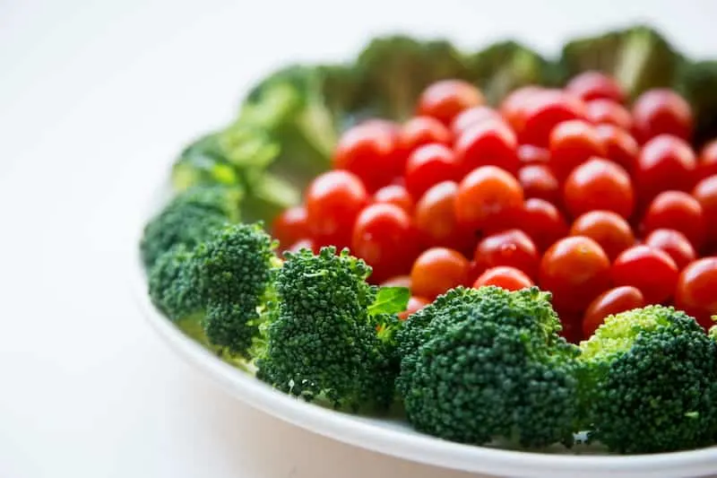 Broccoli and grape tomatoes on plate