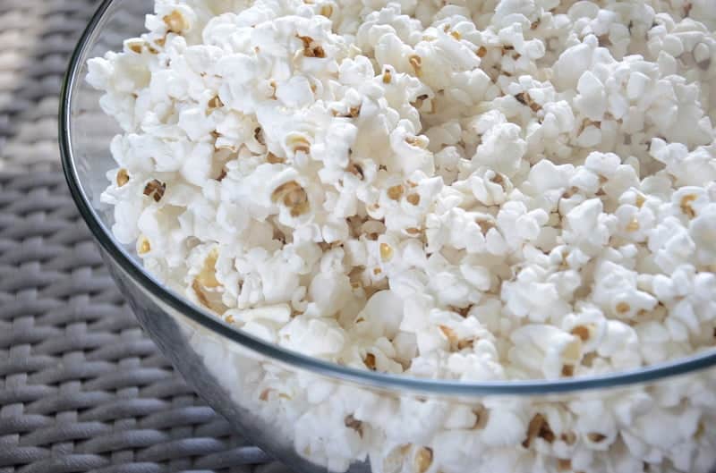 Glass bowl full of popcorn