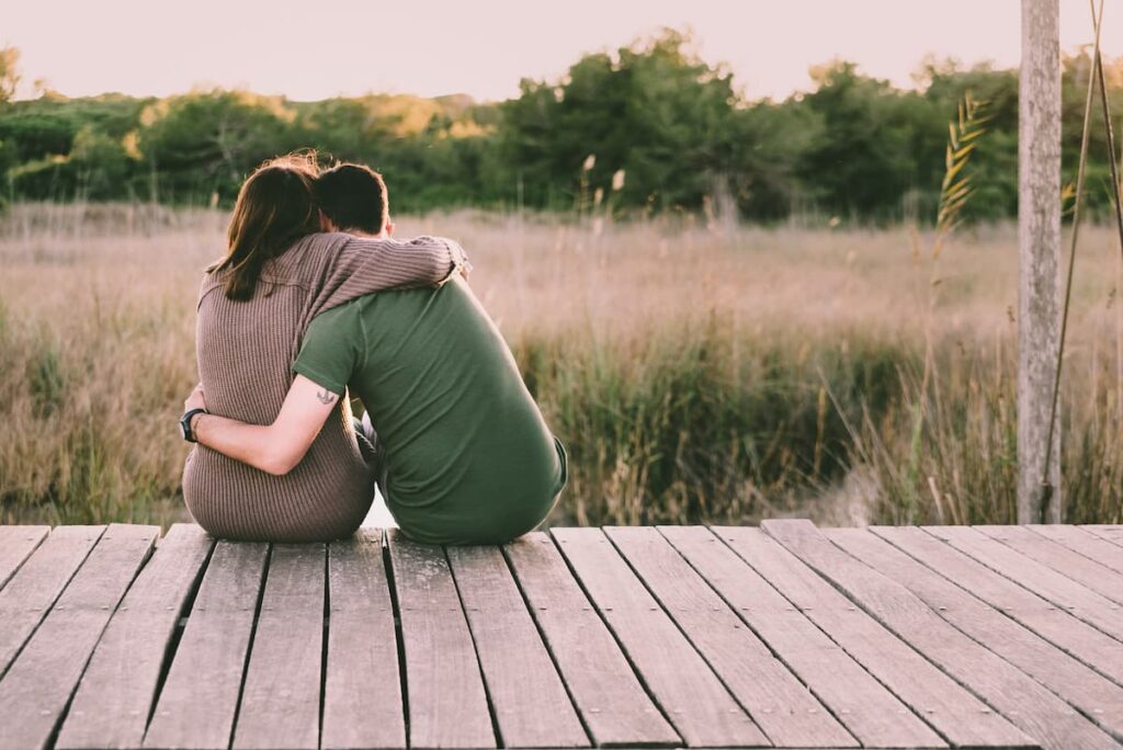 Prayers For Marriage Restoration - husband and wife hugging with backs to the camera
